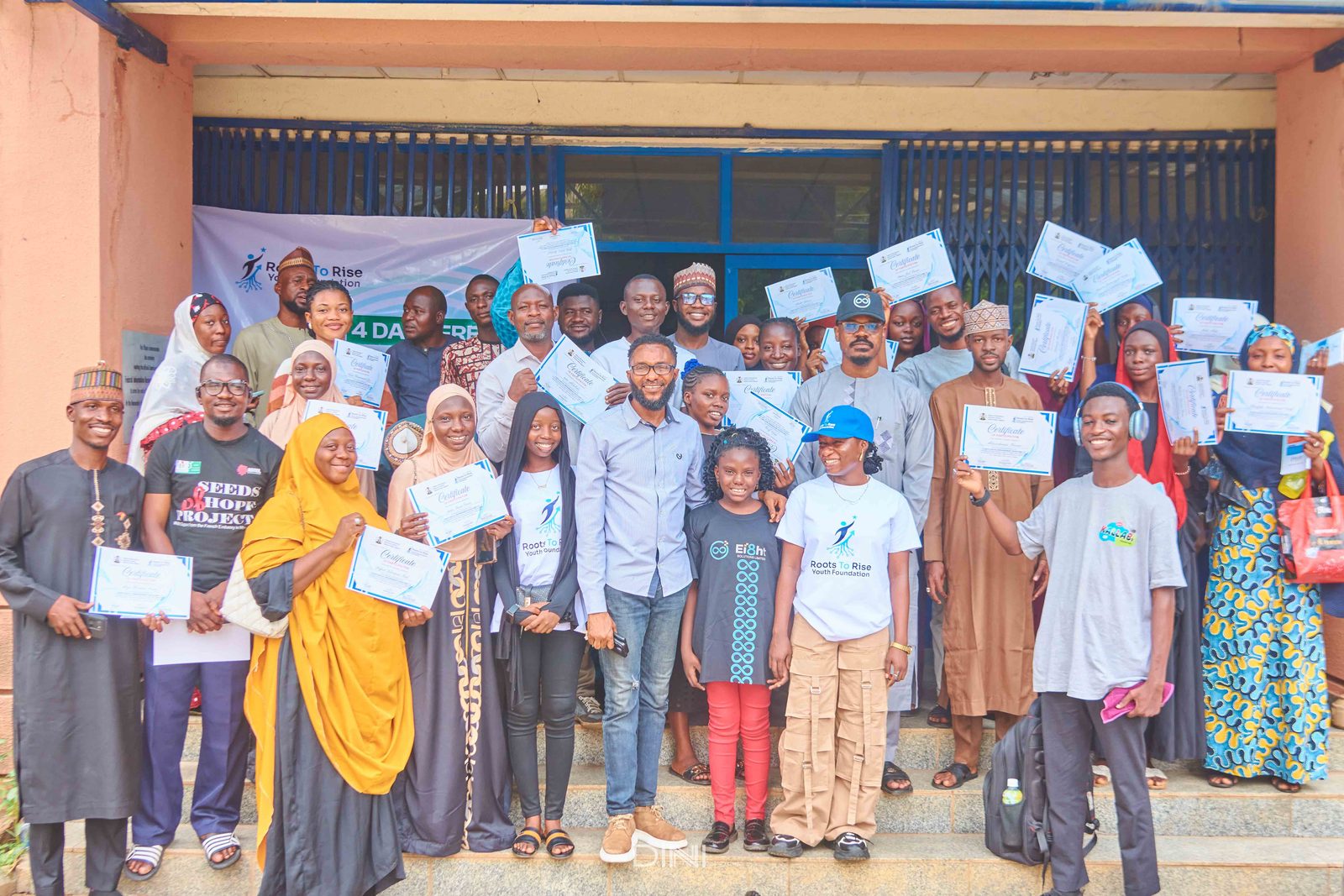 Bootcamp 1.0 participants holding their endorsed certificates of completion